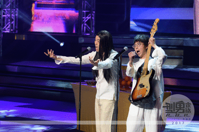 The Emcees of the evening Chung-Ming Poon and Ting Pong Chan re-enactment Hong Kong band 
